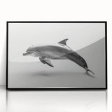 Framed wall art showcasing a vibrant dolphin design in an acrylic finish, featuring a sleek black frame, perfect for marine life enthusiasts and home décor.