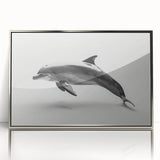 Framed acrylic wall art showcasing a vibrant dolphin design, featuring silver accents and a contemporary aesthetic, perfect for marine-themed decor.