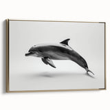 Framed canvas wall art featuring a vibrant dolphin design in a marine life theme, with a gold frame, perfect for ocean enthusiasts and home decor.