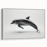 Framed canvas wall art showcasing a vibrant dolphin design in a marine life theme, featuring a white border and side view display, perfect for ocean lovers and home decor.