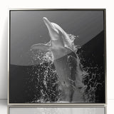 Framed wall art showcasing a striking dolphin design in vibrant colors, set in an elegant silver frame. Perfect for marine life enthusiasts and home decor.