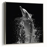 Framed canvas wall art showcasing a stunning dolphin design, silver accents, and a vibrant marine life theme, perfect for ocean-inspired decor.