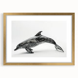 Framed wall art featuring a vibrant dolphin design in gold, showcasing marine life aesthetics, perfect for ocean-themed decor in living spaces or offices.
