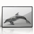 Framed wall art showcasing a vibrant dolphin design, featuring a black frame and acrylic finish, perfect for marine life enthusiasts and coastal decor.
