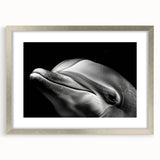 Framed wall art featuring a sleek silver design showcasing marine life with dolphins, elegantly matted for depth, perfect for coastal-themed decor.