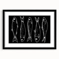 Framed wall art featuring a vibrant marine life fish design with a black frame and mat, showcasing colorful aquatic elements, perfect for ocean-themed decor.