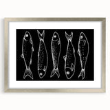 Framed wall art featuring a marine life fish design in vibrant colors, with a sleek silver frame and matting, perfect for coastal-themed decor.
