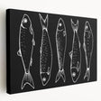 Vibrant stretched canvas wall art showcasing a colorful marine life fish design, featuring detailed aquatic patterns on a deep blue background. Perfect for ocean-themed decor.