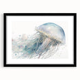 Black-framed wall art featuring a vibrant jellyfish design in a marine life collection, set against a white mat, perfect for coastal-themed decor.