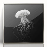 Framed wall art featuring a stunning marine life jellyfish design with a sleek silver frame, showcasing vibrant colors and intricate details, perfect for ocean-themed decor.