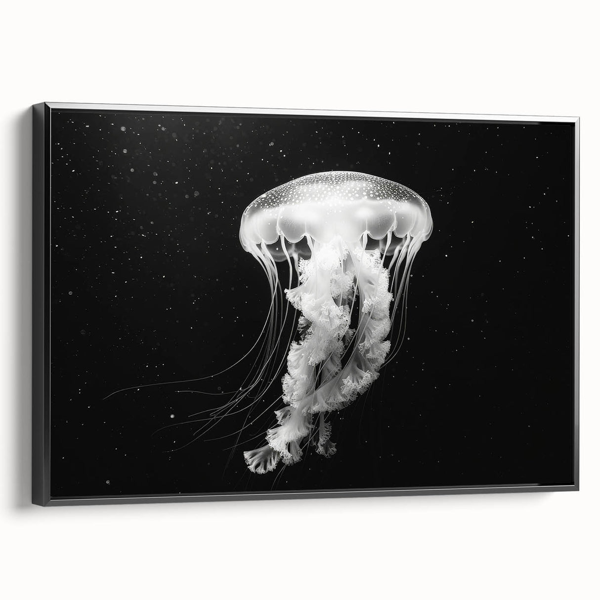 Framed canvas wall art depicting a vibrant jellyfish design in shades of blue and purple, showcasing marine life with a sleek black frame. Perfect for ocean-themed decor.