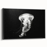 Framed canvas wall art depicting a vibrant jellyfish design in shades of blue and purple, showcasing marine life with a sleek black frame. Perfect for ocean-themed decor.