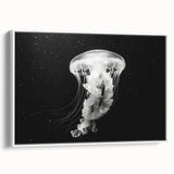 Framed canvas wall art showcasing a vibrant jellyfish design in shades of blue and purple, set against a white background, perfect for ocean-themed decor.