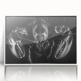 Framed wall art showcasing a vibrant lobster design in an acrylic finish, featuring a sleek white border, perfect for marine-themed decor in coastal homes.