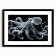 Elegant black-framed wall art featuring a stunning octopus design, showcasing vibrant marine life colors and intricate details, perfect for ocean-themed decor.
