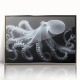 Framed wall art featuring a vibrant octopus design in shades of blue and gold, showcasing marine life with a sleek acrylic front for a modern touch.