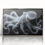 Framed wall art featuring a vibrant octopus design in shades of blue and silver, showcasing marine life. Perfect for ocean-themed decor, it adds a unique touch to any room.