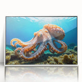 Framed wall art showcasing a vibrant octopus design in shades of blue and orange, set against a white background, perfect for marine life enthusiasts.