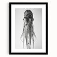 Framed wall art featuring a vibrant octopus design in marine life theme, set against a sleek black mat. Ideal for ocean lovers and modern decor.