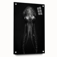 Colorful octopus wall art design displayed in acrylic glass, showcasing intricate marine life details and vibrant hues, perfect for ocean-themed decor.