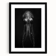 Framed wall art featuring an intricate octopus design, set against a black background, perfect for marine life enthusiasts, adding a touch of oceanic elegance to any decor.