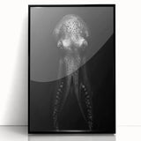 Framed wall art piece showcasing a vibrant octopus design in a marine life theme, featuring a sleek black frame and clear acrylic front for modern decor.
