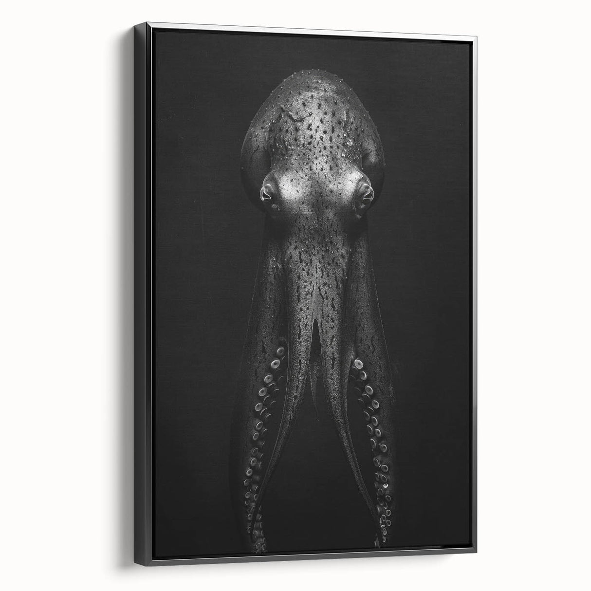 Framed canvas wall art featuring a vibrant octopus design in shades of blue and green, set against a black background, showcasing marine life decor ideal for ocean-themed interiors.