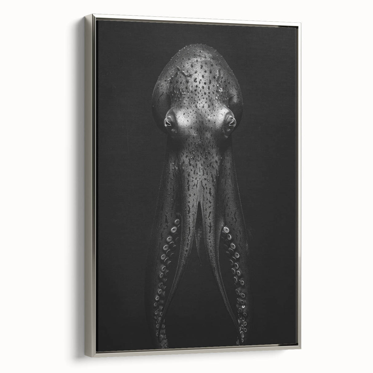 Framed canvas wall art showcasing a vibrant octopus design in shades of blue and silver, perfect for marine-themed decor, adding a modern touch to any room.