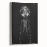 Framed canvas wall art showcasing a vibrant octopus design in shades of blue and silver, perfect for marine-themed decor, adding a modern touch to any room.