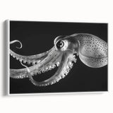 Framed wall art featuring a vibrant octopus design in shades of blue and orange, set against a white background, perfect for marine life enthusiasts and coastal decor.