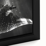 Close-up of a beautifully framed canvas wall art piece showcasing a vibrant marine life ray design, featuring intricate details and vivid colors, perfect for ocean-themed decor.