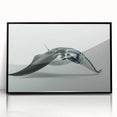 Framed wall art featuring a stunning marine life design of a ray, with a sleek black frame, perfect for ocean-themed decor in a modern living space.