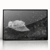 Framed wall art collection featuring a marine life ray design in vibrant colors, set against a sleek black frame, ideal for ocean-themed decor.