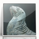 Framed acrylic wall art depicting a playful sea lion in vibrant ocean colors, designed to enhance marine-themed decor with a modern aesthetic. Perfect for nature lovers.