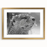 Elegant wall art featuring a sea otter design in a gold frame with a white mat, showcasing marine life in a captivating display ideal for home decor.