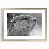 Framed wall art featuring a vibrant sea otter design, showcased in a silver frame with a white mat, perfect for marine life enthusiasts and coastal decor.
