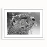 Framed wall art featuring a charming sea otter design, showcasing vibrant marine life colors against a white mat, ideal for ocean-themed decor.