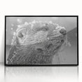 Framed wall art showcasing a vibrant sea otter design, with acrylic glass, black frame, and a modern aesthetic, perfect for marine life enthusiasts.