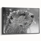 Framed wall art featuring a vibrant sea otter design against a black background, showcasing marine life in a playful pose, ideal for ocean-themed decor.