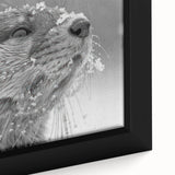 Close-up of a framed canvas wall art featuring a playful sea otter design, showcasing vibrant colors and intricate details, ideal for marine life enthusiasts.