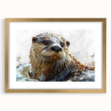Close-up view of a framed wall art piece featuring a marine life design showcasing a playful sea otter, set in a gold frame with a mat, perfect for ocean-themed decor.
