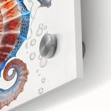 Close-up of a vibrant acrylic wall art piece showcasing a detailed marine life design featuring a seahorse against a colorful background, perfect for ocean-themed decor.