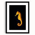 Framed wall art featuring an intricate marine life design of a seahorse, presented in a sleek black frame with a mat, perfect for ocean-themed decor.