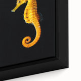Close-up of a beautifully framed marine life wall art piece showcasing a vibrant seahorse design on textured canvas, perfect for ocean-themed decor.