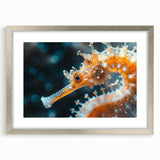 Wall art featuring a detailed seahorse design in a sleek silver frame with a mat, perfect for marine life enthusiasts. Ideal for adding a nautical touch to home decor.