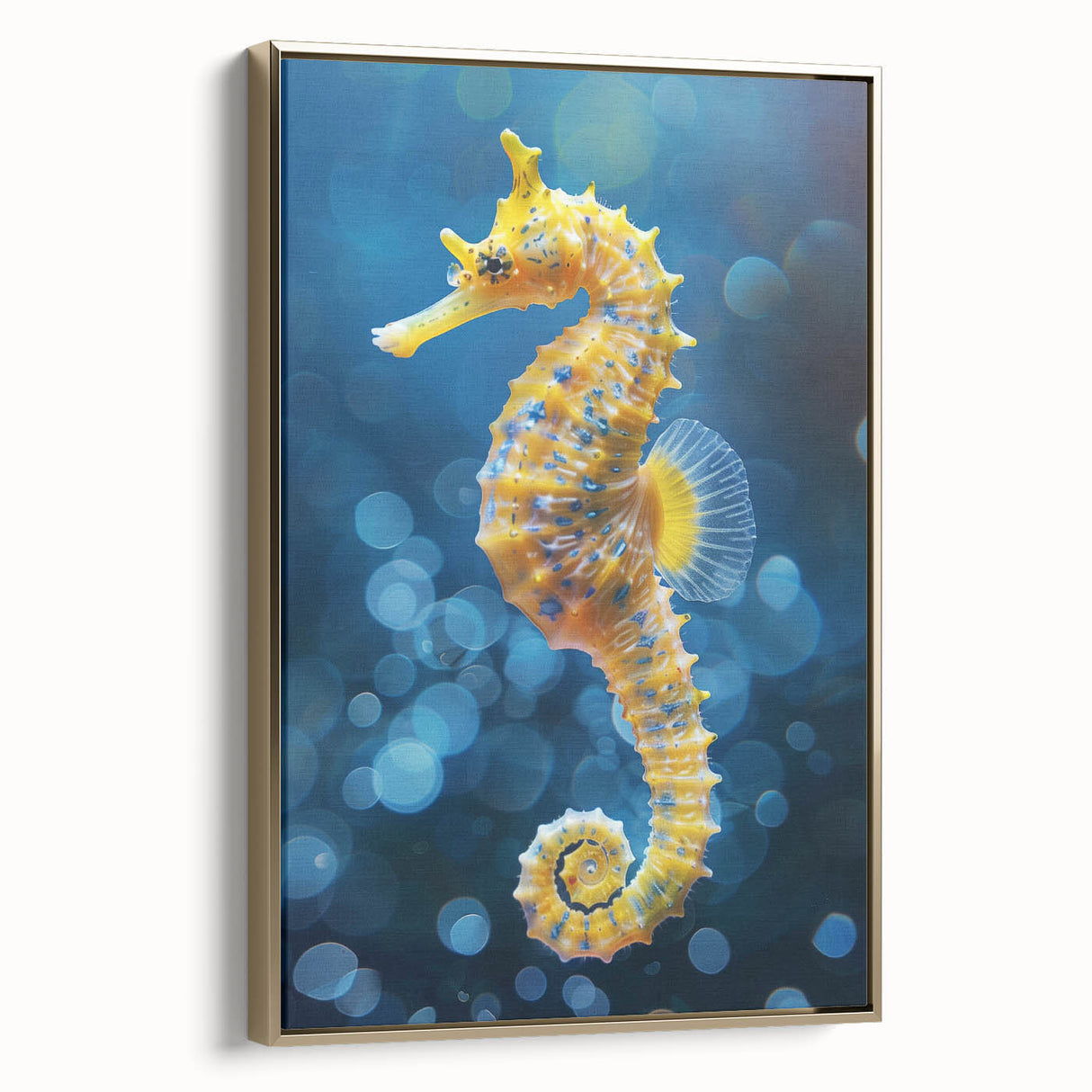 Framed wall art featuring a vibrant gold and blue seahorse design on canvas, perfect for marine-themed decor. Ideal for adding a touch of elegance to any room.