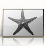 Framed wall art featuring a vibrant starfish design in acrylic with a gold frame, showcasing marine life elements for a coastal-themed decor. Perfect for beach-inspired interiors.