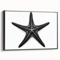 Framed wall art showcasing a marine life starfish design on canvas, featuring vibrant colors and a sleek black frame, perfect for ocean-themed decor.