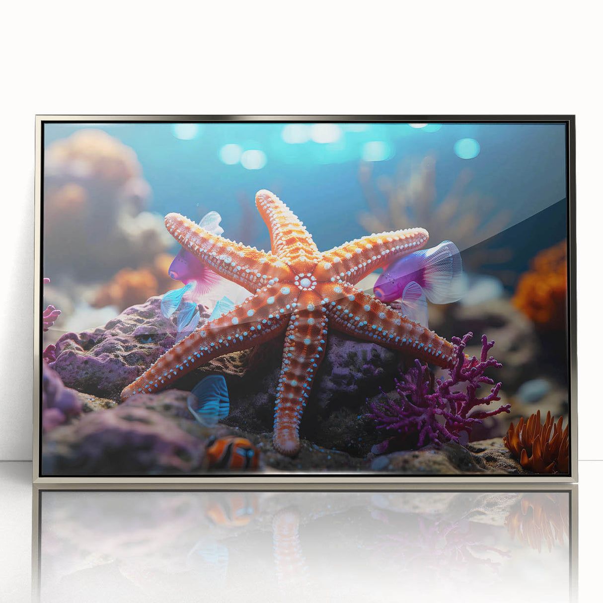 Framed wall art showcasing a vibrant marine life starfish design with a silver-acrylic finish, perfect for coastal home decor. Ideal for ocean lovers.