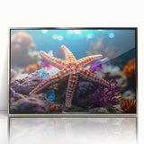 Framed wall art showcasing a vibrant marine life starfish design with a silver-acrylic finish, perfect for coastal home decor. Ideal for ocean lovers.